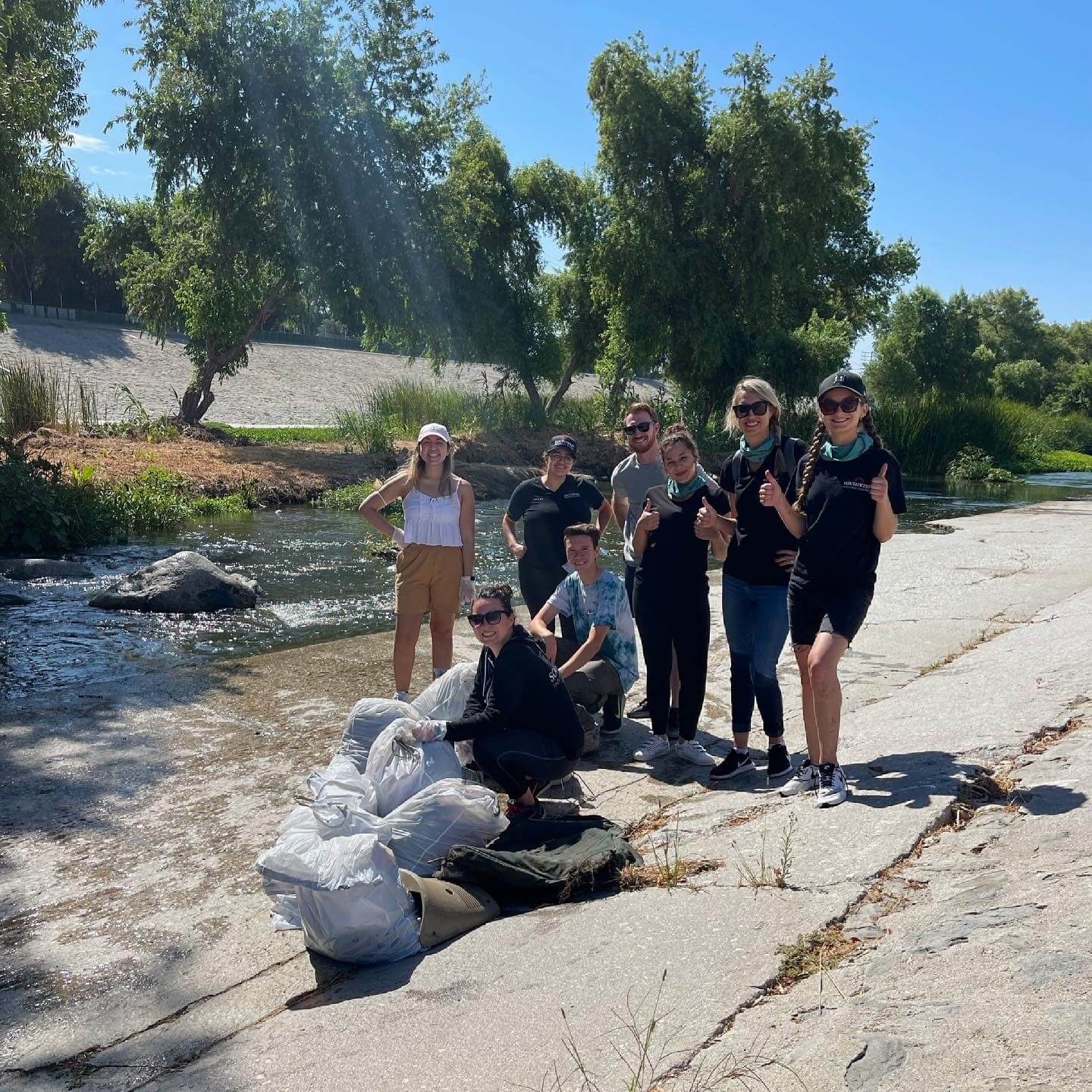 Southwest Electric Team smiling at the Great LA River Cleanup